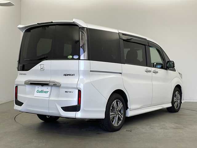 ホンダ ステップワゴン スパーダ eHEV G EXホンダS 新潟県 2020(令2)年 5.6万km プラチナホワイトパール ディーラー純正9インチナビ/(CD.DVD.SD.フルセグ.Bluetooth)/バックカメラ/ステアリングリモコン/LEDオートライト/両側パワースライドドア/ドライブレコーダー/ハーフレザーシート/前席シートヒーター/レーダークルーズコントロール/レーンキープアシスト/プッシュスタート/スマートキー×2/純正フロアマット