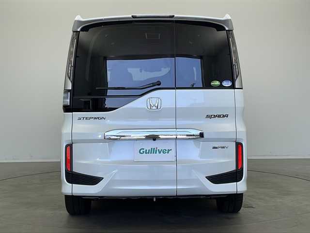 ホンダ ステップワゴン スパーダ eHEV G EXホンダS 新潟県 2020(令2)年 5.6万km プラチナホワイトパール ディーラー純正9インチナビ/(CD.DVD.SD.フルセグ.Bluetooth)/バックカメラ/ステアリングリモコン/LEDオートライト/両側パワースライドドア/ドライブレコーダー/ハーフレザーシート/前席シートヒーター/レーダークルーズコントロール/レーンキープアシスト/プッシュスタート/スマートキー×2/純正フロアマット