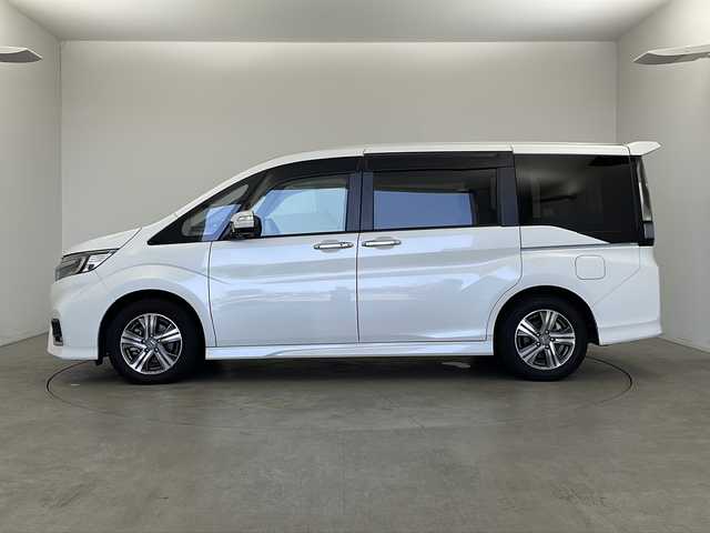ホンダ ステップワゴン スパーダ eHEV G EXホンダS 新潟県 2020(令2)年 5.6万km プラチナホワイトパール ディーラー純正9インチナビ/(CD.DVD.SD.フルセグ.Bluetooth)/バックカメラ/ステアリングリモコン/LEDオートライト/両側パワースライドドア/ドライブレコーダー/ハーフレザーシート/前席シートヒーター/レーダークルーズコントロール/レーンキープアシスト/プッシュスタート/スマートキー×2/純正フロアマット