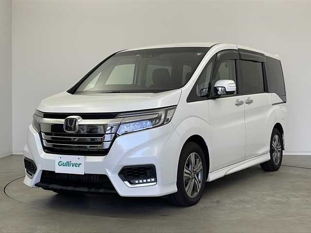 ホンダ ステップワゴン スパーダ eHEV G EXホンダS 新潟県 2020(令2)年 5.6万km プラチナホワイトパール ディーラー純正9インチナビ/(CD.DVD.SD.フルセグ.Bluetooth)/バックカメラ/ステアリングリモコン/LEDオートライト/両側パワースライドドア/ドライブレコーダー/ハーフレザーシート/前席シートヒーター/レーダークルーズコントロール/レーンキープアシスト/プッシュスタート/スマートキー×2/純正フロアマット