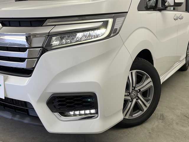 ホンダ ステップワゴン スパーダ eHEV G EXホンダS 新潟県 2020(令2)年 5.6万km プラチナホワイトパール ディーラー純正9インチナビ/(CD.DVD.SD.フルセグ.Bluetooth)/バックカメラ/ステアリングリモコン/LEDオートライト/両側パワースライドドア/ドライブレコーダー/ハーフレザーシート/前席シートヒーター/レーダークルーズコントロール/レーンキープアシスト/プッシュスタート/スマートキー×2/純正フロアマット