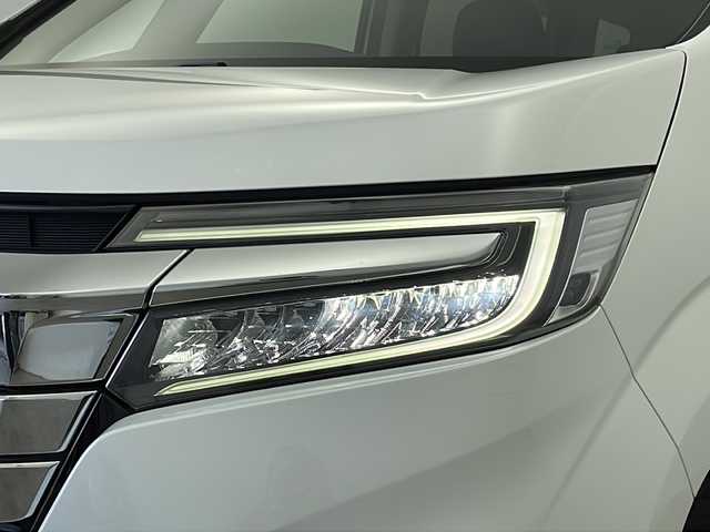 ホンダ ステップワゴン スパーダ eHEV G EXホンダS 新潟県 2020(令2)年 5.6万km プラチナホワイトパール ディーラー純正9インチナビ/(CD.DVD.SD.フルセグ.Bluetooth)/バックカメラ/ステアリングリモコン/LEDオートライト/両側パワースライドドア/ドライブレコーダー/ハーフレザーシート/前席シートヒーター/レーダークルーズコントロール/レーンキープアシスト/プッシュスタート/スマートキー×2/純正フロアマット