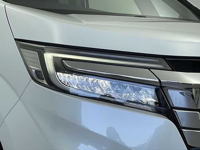 ホンダ ステップワゴン スパーダ eHEV G EXホンダS 新潟県 2020(令2)年 5.6万km プラチナホワイトパール ディーラー純正9インチナビ/(CD.DVD.SD.フルセグ.Bluetooth)/バックカメラ/ステアリングリモコン/LEDオートライト/両側パワースライドドア/ドライブレコーダー/ハーフレザーシート/前席シートヒーター/レーダークルーズコントロール/レーンキープアシスト/プッシュスタート/スマートキー×2/純正フロアマット