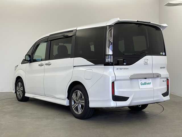 ホンダ ステップワゴン スパーダ eHEV G EXホンダS 新潟県 2020(令2)年 5.6万km プラチナホワイトパール ディーラー純正9インチナビ/(CD.DVD.SD.フルセグ.Bluetooth)/バックカメラ/ステアリングリモコン/LEDオートライト/両側パワースライドドア/ドライブレコーダー/ハーフレザーシート/前席シートヒーター/レーダークルーズコントロール/レーンキープアシスト/プッシュスタート/スマートキー×2/純正フロアマット