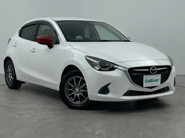 マツダ デミオ 13S ツーリング 三重県 2016(平28)年 2.5万km スノーフレイクホワイトパールマイカ 禁煙車/マツダコネクトナビ/AM/FM/CD/DVD/BT/USB/フルセグTV/バックカメラ/衝突軽減ブレーキ/BSM/LDA/純正ETC/シートヒーター（D席）/ステアリングスイッチ /革巻きステアリング/MTモード付きAT/純正フロアマット/スマートキー/プッシュスタート/社外アルミホイール/オートライト/LEDヘッドライト/HUD