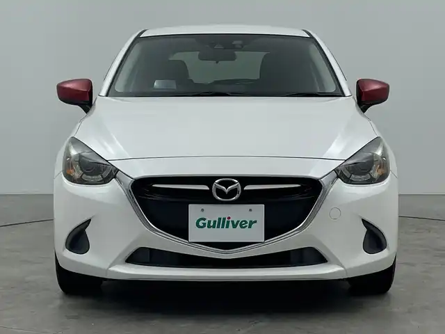 マツダ デミオ 13S ツーリング 三重県 2016(平28)年 2.5万km スノーフレイクホワイトパールマイカ 禁煙車/マツダコネクトナビ/AM/FM/CD/DVD/BT/USB/フルセグTV/バックカメラ/衝突軽減ブレーキ/BSM/LDA/純正ETC/シートヒーター（D席）/ステアリングスイッチ /革巻きステアリング/MTモード付きAT/純正フロアマット/スマートキー/プッシュスタート/社外アルミホイール/オートライト/LEDヘッドライト/HUD