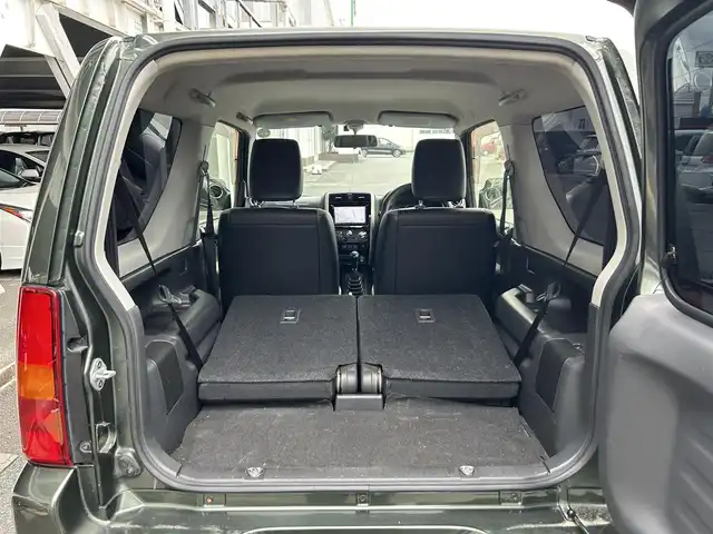 スズキ ジムニー ランドベンチャー 静岡県 2015(平27)年 9.4万km クールカーキPM 特別仕様車/５速ＭＴ/４ＷＤ/純正メモリナビ/フルセグＴＶ/ＤＶＤ再生/ＢＴオーディオ/ＥＴＣ/ハーフレザーシート/シートヒーター/背面タイヤ/ホワイトレタータイヤ/背面タイヤ・ハードカバー付き/ハロゲンヘッドライト/純正フロアマット/RAYS１６ＡＷ