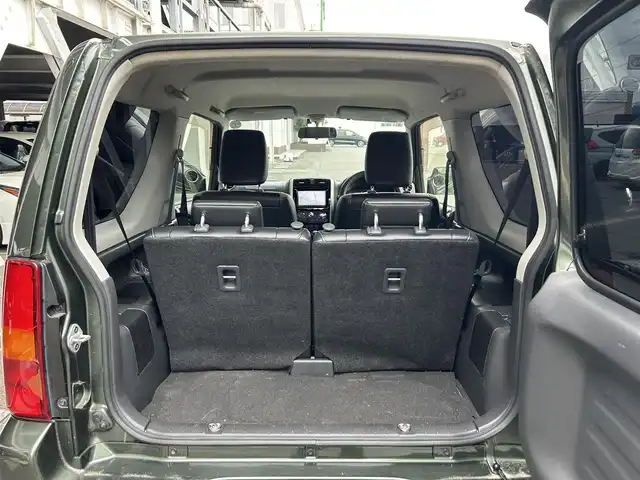 スズキ ジムニー ランドベンチャー 静岡県 2015(平27)年 9.4万km クールカーキPM 特別仕様車/５速ＭＴ/４ＷＤ/純正メモリナビ/フルセグＴＶ/ＤＶＤ再生/ＢＴオーディオ/ＥＴＣ/ハーフレザーシート/シートヒーター/背面タイヤ/ホワイトレタータイヤ/背面タイヤ・ハードカバー付き/ハロゲンヘッドライト/純正フロアマット/RAYS１６ＡＷ