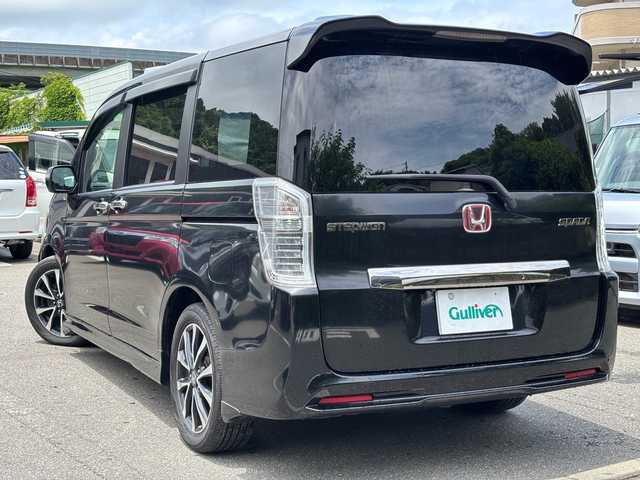 ホンダ ステップワゴン スパーダ Z クールスピリット 福岡県 2013(平25)年 7万km プレミアムスパークルブラックパール ワンオーナー/純正ナビ/（AM/FM/CD/DVD/USB/SD/ミュージックサーバー/ワンセグTV）/横滑り防止/アイドリングストップ/フリップダウンモニター/クルーズコントロール/パドルシフト/ビルドインETC/パワースライドドア（両側）/純正アルミホイール/純正フロアマット/オートライト/フォグランプ/電格ミラー/スペアキー×１/保証書/取扱説明書