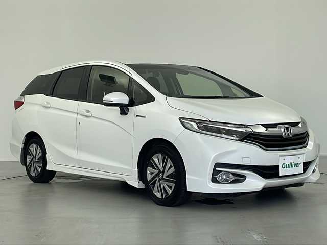 ホンダ シャトル ハイブリッド X スタイルエディション 岐阜県 2016(平28)年 2.6万km ホワイトオーキッドパール 純正SDナビ/CD/DVD/Bluetooth/SD/AM/FM/フルセグTV/バックモニター/シティブレーキアクティブシステム/ECON/オートリトラミラー/クルーズコントロール/ドライブレコーダー/ETC/横滑り抑制機能/パドルシフト/ステアリングリモコン/スマートキー/プッシュスタート/ハーフレザーシート/オートLEDヘッドライト/フォグランプ/純正15インチアルミホイール/純正フロアマット