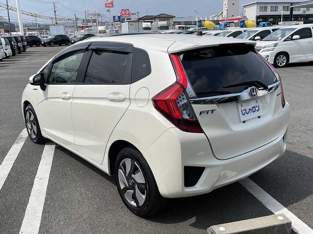 ホンダ フィット ハイブリット Fパッケージ 熊本県 2014(平26)年 1.8万km プレミアムホワイトパール (株)IDOMが運営する【じしゃロン熊本店】の自社ローン専用車両になります/こちらは現金またはオートローンご利用時の価格です。自社ローンご希望の方は別途その旨お申付け下さい./社外ナビ/バックカメラ/純正フロアマット/電動格納ミラー/ステアリングスイッチ/電動格納ミラー/スマートキープッシュスタート/LEDヘットライト