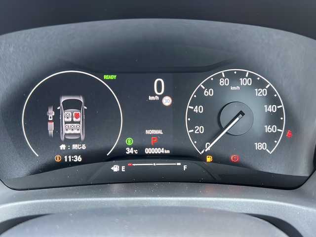 ホンダ ヴェゼル ハイブリッド e:HEV Z 静岡県 2025(令7)年 0.1千km プラチナホワイトパール 純正ナビ/・FM/・AM/・USB/・Bluetooth/・フルセグTV/・スマートフォン連携/ホンダセンシング/●衝突軽減ブレーキ（CMBS）/●先行車発進お知らせ機能/●歩行者事故低減ステアリング/●路外逸脱抑制機能/●標識認識機能/●渋滞追従機能付アダプティブクルーズコントロール（ACC）/●車線維持支援システム（LKAS）/●トラフィックジャムアシスト（渋滞運転支援機能）/●誤発進抑制機能/●後方誤発進抑制機能/●近距離衝突軽減ブレーキ/●急アクセル抑制機能/●パーキングセンサーシステム/主要装備/・バックカメラ/・ＥＴＣ２．０/・ワイヤレス充電/・ブラインドスポットモニター/・パワーバックドア/・パーキングセンサー/・運転席+助手席シートヒーター/・アダプティブドライビングビーム/・パドルシフト/・後退出庫サポート