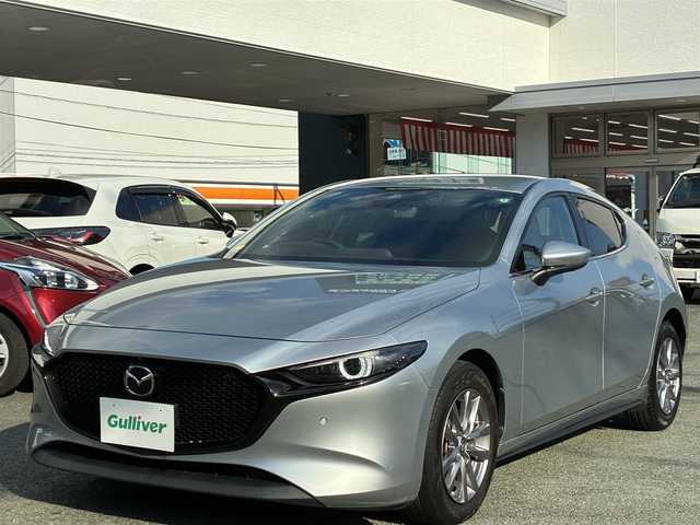 マツダ マツダ３ファストバック XD プロアクティブ 熊本県 2020(令2)年 7.1万km ソニックシルバーM 純正メーカーナビ/【フルセグTV/Bluetooth/CD/DVD/HDMI】/アラウンドビューモニター/レーダークルーズコントロール/衝突軽減防止装置/コーナーセンサー/ブラインドスポットモニター/ヘッドアップディスプレイ/ブラインドスポットモニター/パドルシフト/オートLEDライト/オートハイビーム/ブレーキホールド/プッシュスタート/スマートキー/ETC/ドライブレコーダー/革巻きステアリング/純正フロアマット/アイドリングストップ/ABS/盗難防止装置