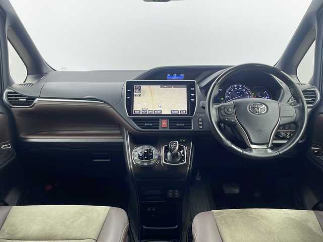 トヨタ エスクァイア ハイブリッド Gi プレミアムパッケージ 栃木県 2017(平29)年 3万km スパークリングブラックパールクリスタルシャイン 純正10.5型SDナビ/(フルセグTV/CD/DVD/BT)/バックカメラ/フリップダウンモニター/トヨタセーフティーセンス/両側パワースライドドア/クルーズコントロール/横滑り防止/車線逸脱抑制機能/先行車発進お知らせ/ETC/シートヒーター/ステアリングヒーター/電動格納ミラー/純正フロアマット/純正15インチアルミホイール/スマートキー/プッシュスタート/スペアキー