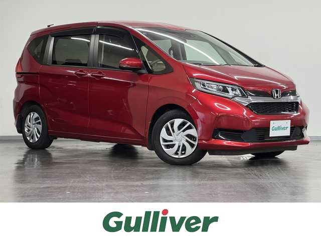 ホンダ フリード＋ G ホンダセンシング 三重県 2020(令2)年 0.4万km プレミアムクリスタルレッドM ガソリン/FF/インパネCVT/純正 7インチナビ VXM-204VFi/（CD/DVD/FM/AM/TV/iPod/SD/MusicRack/USB/Bluetooth/AUX）/バックカメラ/両側パワースライドドア/ドライブレコーダー 前方/ビルトイン ETC/Honda SENSING/・衝突軽減ブレーキ［CMBS］/・車線維持支援システム［LKAS］/・アダプティブクルーズコントロール［ACC］/・路外逸脱抑制機能/・標識認識機能/・先行車発進お知らせ機能/・VSA（ABS＋TRC、横すべり抑制）/など/装備/・シートヒーター（D/N）/・オートエアコン/・オートライト/・LEDヘッドランプ/・ステアリングスイッチ/・インフォメーションディスプレイ/・ECONスイッチ/・電動格納ドアミラー/・プッシュスタート/・スマートキーx2/・純正ホイールキャップ＋15インチスチールホイール/など
