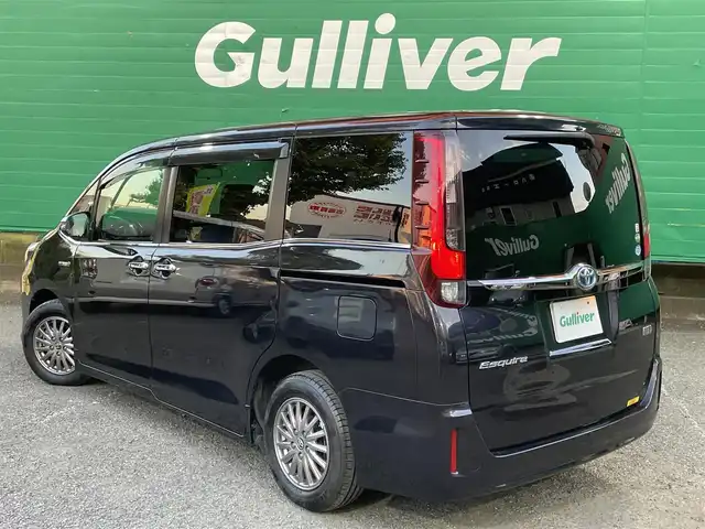 トヨタ エスクァイア ハイブリッド Gi ブラックテーラード 東京都 2016(平28)年 4.5万km スパークリングブラックパールクリスタルシャイン 純正9インチナビ（NSZT-Y66T）/・フルセグTV/DVD/Bluetoothオーディオ/両側電動スライドドア/バックカメラ/ドライブレコーダー前後/トヨタセーフティセンスC/・プリクラッシュセーフティシステム/・レーンディパーチャーアラート/・オートマチックハイビーム/合皮シート/前席シートヒーター/純正15インチアルミホイール/保証書/取扱説明書/スペアキー