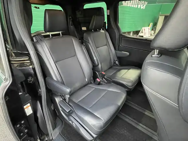 トヨタ エスクァイア ハイブリッド Gi ブラックテーラード 東京都 2016(平28)年 4.5万km スパークリングブラックパールクリスタルシャイン 純正9インチナビ（NSZT-Y66T）/・フルセグTV/DVD/Bluetoothオーディオ/両側電動スライドドア/バックカメラ/ドライブレコーダー前後/トヨタセーフティセンスC/・プリクラッシュセーフティシステム/・レーンディパーチャーアラート/・オートマチックハイビーム/合皮シート/前席シートヒーター/純正15インチアルミホイール/保証書/取扱説明書/スペアキー