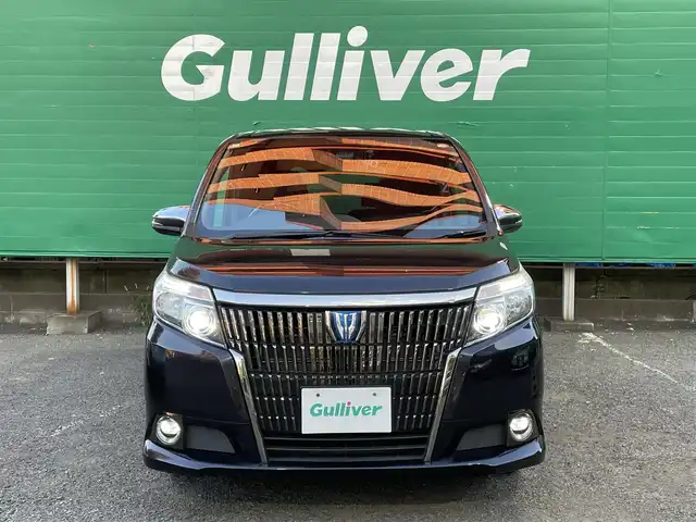 トヨタ エスクァイア ハイブリッド Gi ブラックテーラード 東京都 2016(平28)年 4.5万km スパークリングブラックパールクリスタルシャイン 純正9インチナビ（NSZT-Y66T）/・フルセグTV/DVD/Bluetoothオーディオ/両側電動スライドドア/バックカメラ/ドライブレコーダー前後/トヨタセーフティセンスC/・プリクラッシュセーフティシステム/・レーンディパーチャーアラート/・オートマチックハイビーム/合皮シート/前席シートヒーター/純正15インチアルミホイール/保証書/取扱説明書/スペアキー