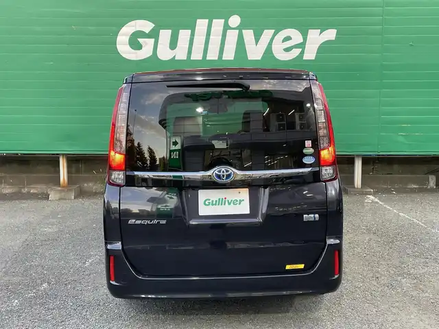 トヨタ エスクァイア ハイブリッド Gi ブラックテーラード 東京都 2016(平28)年 4.5万km スパークリングブラックパールクリスタルシャイン 純正9インチナビ（NSZT-Y66T）/・フルセグTV/DVD/Bluetoothオーディオ/両側電動スライドドア/バックカメラ/ドライブレコーダー前後/トヨタセーフティセンスC/・プリクラッシュセーフティシステム/・レーンディパーチャーアラート/・オートマチックハイビーム/合皮シート/前席シートヒーター/純正15インチアルミホイール/保証書/取扱説明書/スペアキー