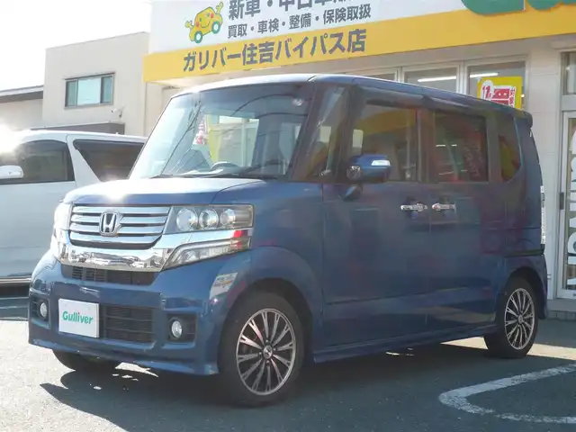 ホンダ Ｎ ＢＯＸ カスタム G ターボパッケージ 静岡県 2013(平25)年 8.8万km プレミアムダイナミックブルーパール ワンオーナー/禁煙車/両側パワースライドドア/社外ナビ/バックカメラ/クルーズコントロール/パドルシフト/ステアリングスイッチ/純正アルミホイール/オートライト/キセノンライト/フロアマット/ドアバイザー/スマートキー/新車保証書/取扱説明書