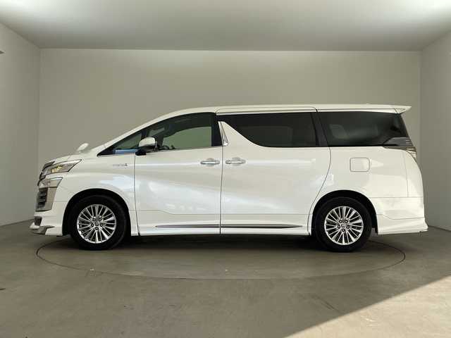 トヨタ ヴェルファイア ハイブリット Z ゴールデンアイズ 兵庫県 2021(令3)年 6.5万km ホワイトパールクリスタルシャイン ・純正ナビCD/DVD/USB/Miracast/Bluetooth/TV/HDMI/・純正フリップダウンモニター/・バックカメラ/・ビルトインETC/・モデリスタエアロ（F.S.R）/・前後ドライブレコーダー/・両側パワースライドドア/・パワーバックドア/・Toyota　Safety　Sense/・プリクラッシュセーフティ/・レーントレーシングアシスト/・レーダークルーズコントロール（全車速追従機能付）/・ロードサインアシスト/・アダプティブハイビームシステム/・先行車発進告知/・三眼ＬＥＤヘッドライト/・フォグランプ/・AC100V電源/・純正アルミホイール/・社外フロアマット/・社外レーダー探知機/・ウッドコンビステアリング/・スマートキー/・スペアキー