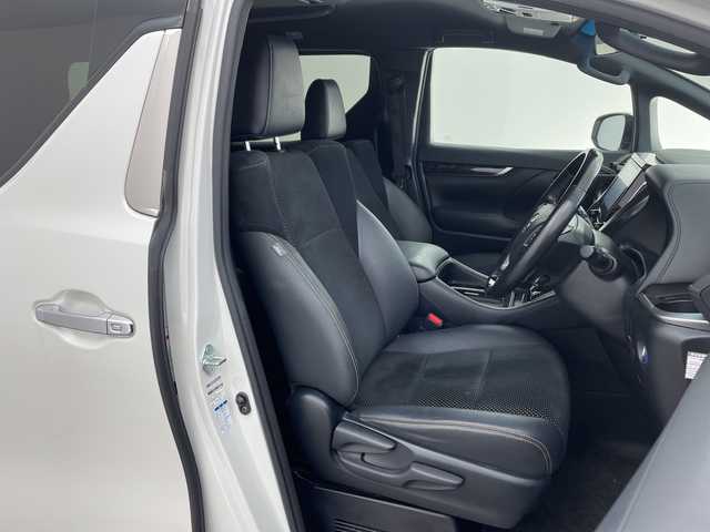 トヨタ ヴェルファイア ハイブリット Z ゴールデンアイズ 兵庫県 2021(令3)年 6.5万km ホワイトパールクリスタルシャイン ・純正ナビCD/DVD/USB/Miracast/Bluetooth/TV/HDMI/・純正フリップダウンモニター/・バックカメラ/・ビルトインETC/・モデリスタエアロ（F.S.R）/・前後ドライブレコーダー/・両側パワースライドドア/・パワーバックドア/・Toyota　Safety　Sense/・プリクラッシュセーフティ/・レーントレーシングアシスト/・レーダークルーズコントロール（全車速追従機能付）/・ロードサインアシスト/・アダプティブハイビームシステム/・先行車発進告知/・三眼ＬＥＤヘッドライト/・フォグランプ/・AC100V電源/・純正アルミホイール/・社外フロアマット/・社外レーダー探知機/・ウッドコンビステアリング/・スマートキー/・スペアキー