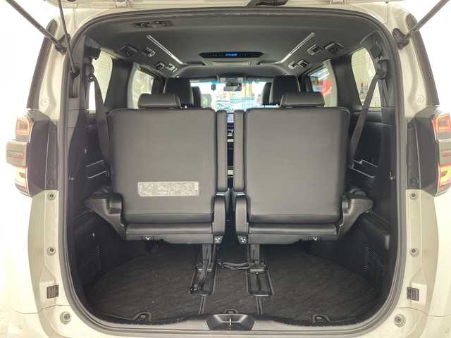 トヨタ ヴェルファイア ハイブリット Z ゴールデンアイズ 兵庫県 2021(令3)年 6.5万km ホワイトパールクリスタルシャイン ・純正ナビCD/DVD/USB/Miracast/Bluetooth/TV/HDMI/・純正フリップダウンモニター/・バックカメラ/・ビルトインETC/・モデリスタエアロ（F.S.R）/・前後ドライブレコーダー/・両側パワースライドドア/・パワーバックドア/・Toyota　Safety　Sense/・プリクラッシュセーフティ/・レーントレーシングアシスト/・レーダークルーズコントロール（全車速追従機能付）/・ロードサインアシスト/・アダプティブハイビームシステム/・先行車発進告知/・三眼ＬＥＤヘッドライト/・フォグランプ/・AC100V電源/・純正アルミホイール/・社外フロアマット/・社外レーダー探知機/・ウッドコンビステアリング/・スマートキー/・スペアキー