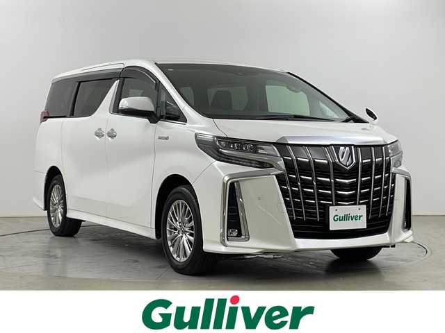 トヨタ アルファードハイブリット SR 道央・札幌 2019(平31)年 5.4万km ホワイトパールクリスタルシャイン ・4WD/・トヨタセーフティセンス/・プリクラッシュセーフティ/・純正メモリナビ/・CD/DVD/BT/SD/・フルセグ/・両側パワースライドドア/・レーダークルーズコントロール/・LEDオートライト/・オートマチックハイビーム/・フリップダウンモニター/・パワーシート/・シートヒーター/エアーシート/・レーンアシスト/・横滑り防止装置/・衝突軽減システム/・前後コーナーセンサー/・バックカメラ/・スマートキー/・ETC
