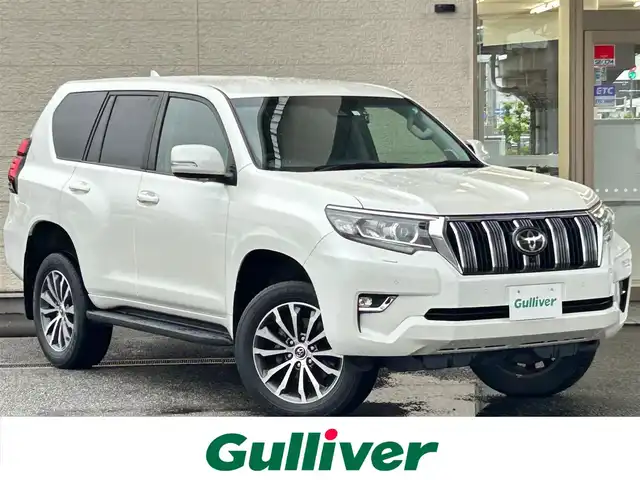 トヨタ ランドクルーザー プラド TX Lパッケージ 兵庫県 2020(令2)年 3.5万km ホワイトパールクリスタルシャイン 純正メーカーOPナビ/（AM/FM/CD/TV/BT)/フルセグTV/全周囲カメラ/ETC/オートハイビーム/フルレザーシート/前席パワーシート/シートヒーター/ベンチレーション/トヨタセーフティーセンス/レーダークルーズコントロール/レーンキープアシスト/前後ドライブレコーダー/純正フロアマット/LEDヘットライト/純正19インチアルミホイール/取扱説明書/保証書