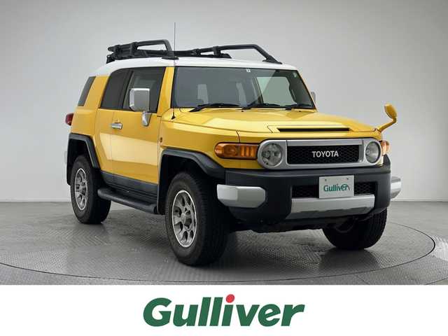 トヨタ ＦＪクルーザー カラーパッケージ 兵庫県 2011(平23)年 6.1万km イエロー/ホワイト 社外メモリナビ(CD/DVD/SD/Bt/フルセグ)/バックカメラ/4WD/ルーフキャリア/サイドステップ/クルーズコントロール/クリアランスソナー/ヘッドライトレベライザー/スペアキーx１/背面タイヤ/ETC/純正マット/純正17AW