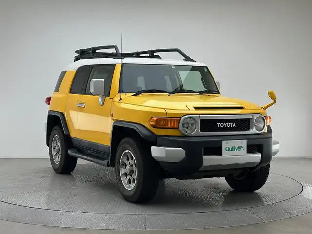 トヨタ ＦＪクルーザー カラーパッケージ 兵庫県 2011(平23)年 6.1万km イエロー/ホワイト 社外メモリナビ(CD/DVD/SD/Bt/フルセグ)/バックカメラ/4WD/ルーフキャリア/サイドステップ/クルーズコントロール/クリアランスソナー/ヘッドライトレベライザー/スペアキーx１/背面タイヤ/ETC/純正マット/純正17AW