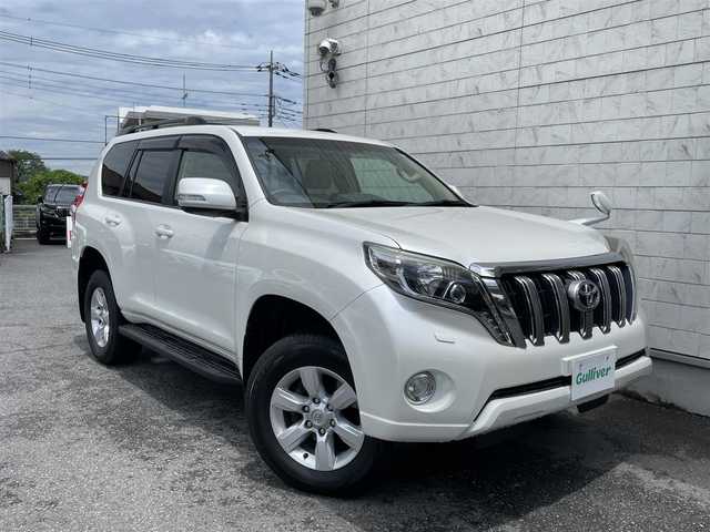トヨタ ランドクルーザー プラド TX 埼玉県 2014(平26)年 5.6万km ホワイトパールクリスタルシャイン ワンオーナー/外部検査済み/中期型/OPナビゲーション/（CD/DVD/Bluetooth/フルセグTV）/バックカメラ/OPルーフレール/サイドステップ/ベージュ内装インテリア/ウインカードアミラー/LEDヘッドライト/全席オートパワーウインドウ/スリップコントロール/スマートキー/スペアキー/新車保証書/取扱説明書