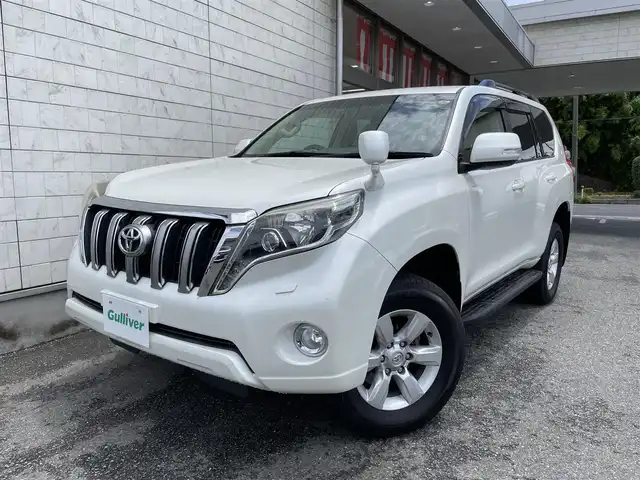 トヨタ ランドクルーザー プラド TX 埼玉県 2014(平26)年 5.6万km ホワイトパールクリスタルシャイン ワンオーナー/外部検査済み/中期型/OPナビゲーション/（CD/DVD/Bluetooth/フルセグTV）/バックカメラ/OPルーフレール/サイドステップ/ベージュ内装インテリア/ウインカードアミラー/LEDヘッドライト/全席オートパワーウインドウ/スリップコントロール/スマートキー/スペアキー/新車保証書/取扱説明書