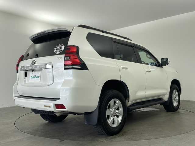 トヨタ ランドクルーザー プラド TX 兵庫県 2018(平30)年 5.4万km ホワイトパールクリスタルシャイン ・Toyota Safet Sense/・プリクラッシュセーフティ（歩行者［昼］検知機能付衝突回避支援タイプ/ ミリ波レーダー＋単眼カメラ方式）/・レーンディパーチャーアラート/・オートマチックハイビーム/・レーダークルーズコントロール（ブレーキ制御付）/・VSC＆TRC（トラクションコントロール）＋ヒルスタートアシストコントロール（HAC）＋電動センターデフロック/・LEDヘッドランプ［ハイ・ロービーム］/ オートレベリング機能付＋/LEDクリアランスランプ（デイライト機能付）＋ヘッドランプクリーナー/・純正9型ナビ＆フルセグ＆BT＆DVD/・バックカメラ/・スマートキー/・プッシュスタート/・純正前方ドライブレコーダー/・純正17インチアルミホイール/・ルーフレール/・フロアマット/・前後コーナーセンサー/・ビルトインETC/・横滑り防止装置/・サイドターンランプ付電動格納式リモコンカラードドアミラー（ヒーター付）/・LEDハイマウントストップランプ付リヤスポイラー