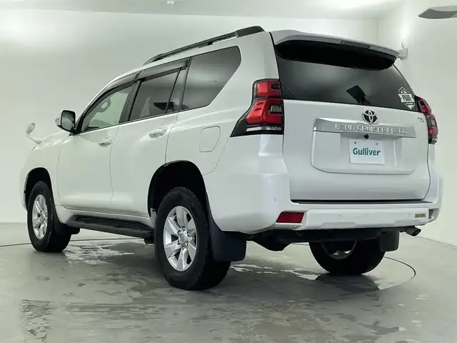 トヨタ ランドクルーザー プラド TX 福井県 2018(平30)年 5.4万km ホワイトパールクリスタルシャイン 純正９インチナビ/CD/DVD/フルセグTV/Bluetooth/AM/FM/バックカメラ /Toyota Safet Sense/・プリクラッシュセーフティ（歩行者［昼］検知機能付衝突回避支援タイプ/ ミリ波レーダー＋単眼カメラ方式）/・レーンディパーチャーアラート/・オートマチックハイビーム/・レーダークルーズコントロール（ブレーキ制御付）/・VSC＆TRC（トラクションコントロール）＋ヒルスタートアシストコントロール（HAC）＋電動センターデフロック/・LEDヘッドランプ［ハイ・ロービーム］/ オートレベリング機能付＋/LEDクリアランスランプ（デイライト機能付）＋ヘッドランプクリーナー/プッシュスタート/スマートキー/純正前方ドライブレコーダー/純正17インチアルミホイール/ルーフレール/フロアマット/前後コーナーセンサー/ビルトインETC/横滑り防止装置/サイドターンランプ付電動格納式リモコンカラードドアミラー（ヒーター付）/LEDハイマウントストップランプ付リヤスポイラー