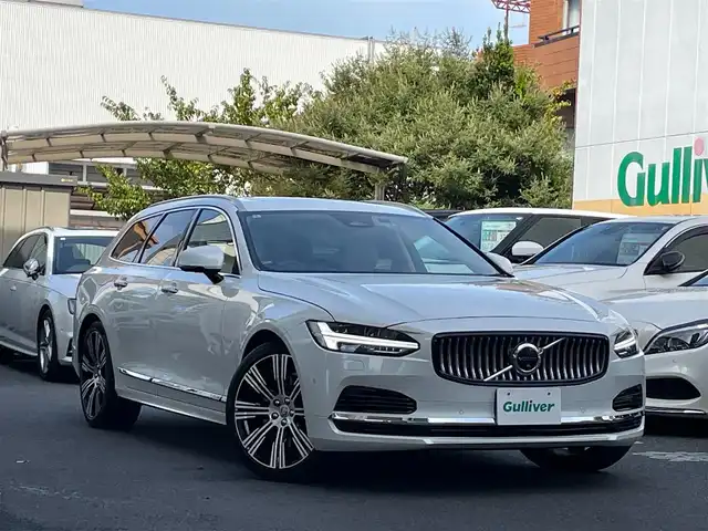 ボルボ Ｖ９０ 東京都 2021(令3)年 3.8万km パール PHEV/Pilot Assist/純正メーカーナビ/全周囲カメラ/AppleCarPlay Bluetooth/harman kardon/パノラマガラスルーフ（チルト機能付き）/本革シート/メモリ機能付きパワーシート/シートヒーター（全席）/エアシート（前席）/ステアリングヒーター/パワーバックドア/レーダークルーズコントロール/ヘッドアップディスプレイ/レーンキープ/ロードサインインフォメーション/前車発信通知機能/後席サンシェード/ETC2.0/純正２０インチAW