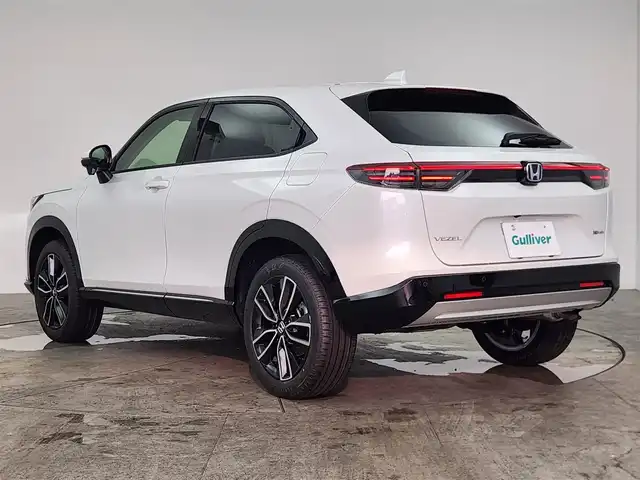 ホンダ ヴェゼル ハイブリッド e:HEV Z 愛知県 2025(令7)年 0.1千km プラチナホワイトパール 登録済未使用車/ホンダセンシング/　・衝突軽減ブレーキ（CMBS）/　・渋滞追従機能付アダプティブクルーズコントロール（ACC）/　・車線維持支援システム（LKAS）/　・ブラインドスポットインフォメーション/　・誤発進抑制機能/純正ディスプレイオーディオ/　（AppleCarPlay/AndroidAuto対応）/バックカメラ/ＥＴＣ２．０/置くだけ充電/パワーバックドア/前席シートヒーター/スマートキー×２/純正１８インチアルミホイール