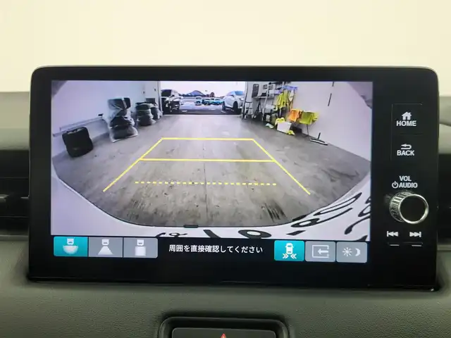 ホンダ ヴェゼル ハイブリッド e:HEV Z 愛知県 2025(令7)年 0.1千km プラチナホワイトパール 登録済未使用車/ホンダセンシング/　・衝突軽減ブレーキ（CMBS）/　・渋滞追従機能付アダプティブクルーズコントロール（ACC）/　・車線維持支援システム（LKAS）/　・ブラインドスポットインフォメーション/　・誤発進抑制機能/純正ディスプレイオーディオ/　（AppleCarPlay/AndroidAuto対応）/バックカメラ/ＥＴＣ２．０/置くだけ充電/パワーバックドア/前席シートヒーター/スマートキー×２/純正１８インチアルミホイール