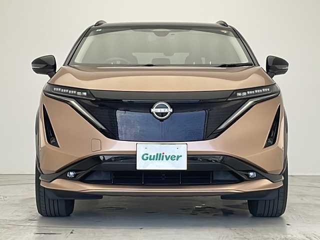 日産 アリア B6 愛知県 2023(令5)年 2.1万km オレンジ プロパイロット/衝突軽減システム/純正12.4型ディズプレイオーディオ　ナビ機能あり/全方位カメラ/クルーズコントロール/シートヒーター　全席/フルセグ/Bluetooth/バックカメラ/電動リアゲート/パワーシート/コーナーセンサー/純正アルミホイール/ルーフレール/ETC2.0/ブラインドスポットモニター/LEDヘッドライト/ステアリングヒーター/インテリジェントミラー/オートマチックハイビーム/ドライブレコーダー/置くだけ充電機/ステアリングスイッチ/スマートキー/プッシュスタート