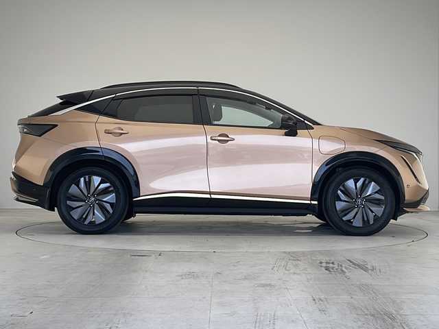 日産 アリア B6 愛知県 2023(令5)年 2.1万km オレンジ プロパイロット/衝突軽減システム/純正12.4型ディズプレイオーディオ　ナビ機能あり/全方位カメラ/クルーズコントロール/シートヒーター　全席/フルセグ/Bluetooth/バックカメラ/電動リアゲート/パワーシート/コーナーセンサー/純正アルミホイール/ルーフレール/ETC2.0/ブラインドスポットモニター/LEDヘッドライト/ステアリングヒーター/インテリジェントミラー/オートマチックハイビーム/ドライブレコーダー/置くだけ充電機/ステアリングスイッチ/スマートキー/プッシュスタート
