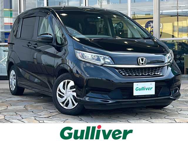 ホンダ フリード G ホンダセンシング 静岡県 2020(令2)年 4.3万km クリスタルブラックパール 純正ナビ/・CD/DVD/・FM/AM/・フルセグTV/・iPod/・SD/Music Rack/・USB/・Bluetooth/主要装備/・ＥＴＣ/・両側パワースライドドア/・バックカメラ/・ＬＥＤヘッドライト/・アクティブコーナリングライト/・運転席＋助手席シートヒーター/・アイドリングストップ/・ホンダセンシング/・追従クルコン/・横滑り防止装置/・オートライト/・ＥＣＯＮ/・オートエアコン