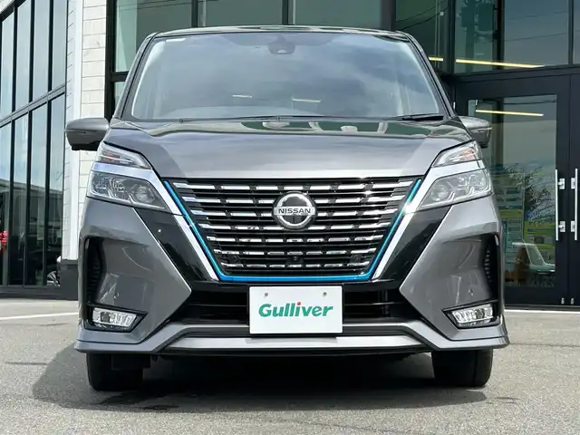 日産 セレナ e－パワー ハイウェイスター V 愛媛県 2020(令2)年 4.5万km ダークメタルグレー 純正7型ナビ/純正11型後席天吊モニター/両側電動スライド/左側ハンズフリースライド/プロパイロット/ブラインドスポットモニター/全周囲カメラ/純正ドライブレコーダー/前席温シート/ステアリングヒーター/ステアリングリモコン/電格ミラー/電動パーキングブレーキ/AutoHold/USB充電/LEDヘッドライト/純正ドアバイザー/現状サマー(純正AW)(195/65/R15)/DUNLOP ENASAVE RV505
