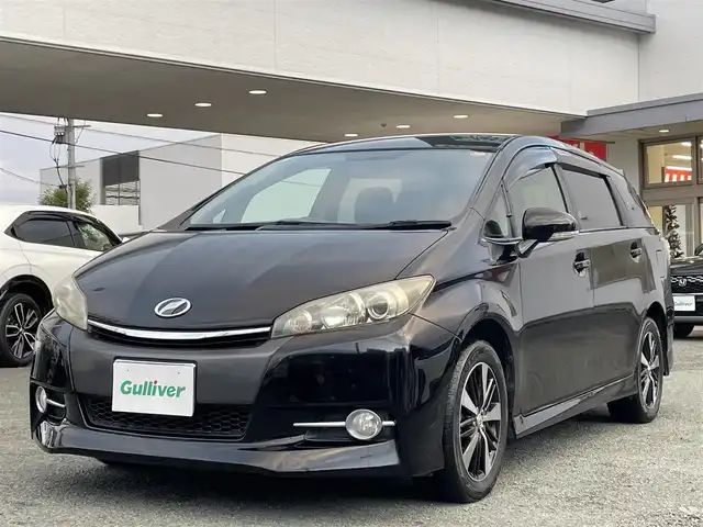 トヨタ ウィッシュ 1．8S 熊本県 2013(平25)年 16.5万km ブラック ワンオーナー/純正ナビ（NSZT-W62G）/【フルセグTV/Bluetooth/CD/DVD】/パドルシフト/オートライト/ウィンカーミラー/純正16インチAW/プッシュスタート/スマートキー/革巻きステアリング/純正フロアマット/ドアバイザー/横滑り防止装置/ABS/盗難防止装置/保証書/取扱説明書