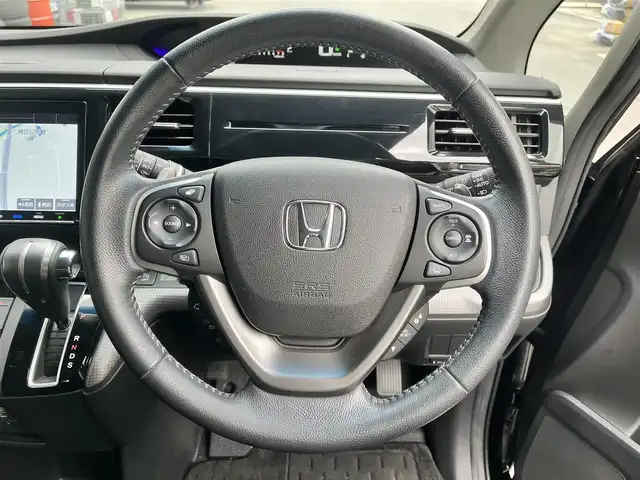 ホンダ ステップワゴン スパーダ ホンダセンシング 滋賀県 2020(令2)年 4.8万km プレミアムスパークルブラックパール 純正９インチナビ/Bluetooth/USB/CD/DVD/フルセグ/前後ドラレコ/ホンダセンシング/追従クルーズコントロール/MTモード付AT/オートライト/LEDヘッドライト/バックカメラ/両側電動スライド/ウォークスルー/フリップダウンモニター/ビルトインETC2.0/プッシュスタート/スマートキー/ステアリングリモコン/ワクワクゲート