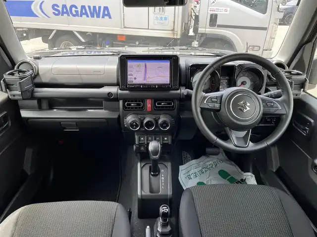 スズキ ジムニー XC 石川県 2022(令4)年 0.9万km ジャングルグリーン 4WD/ターボ/社外8型メモリーナビ/フルセグTV/バックカメラ/LEDヘッドライト/ETC/純正アルミホイール/レーダーブレーキ/シートヒーター/スマートキー/プッシュスタート/電動ミラー/クルーズコントロール/社外グリル/保証書