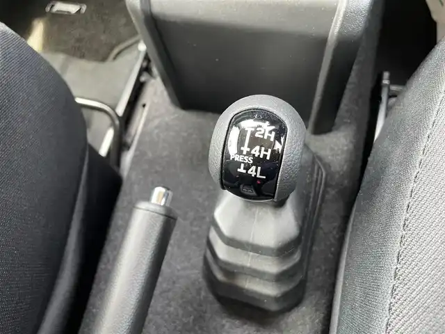 スズキ ジムニー XC 石川県 2022(令4)年 0.9万km ジャングルグリーン 4WD/ターボ/社外8型メモリーナビ/フルセグTV/バックカメラ/LEDヘッドライト/ETC/純正アルミホイール/レーダーブレーキ/シートヒーター/スマートキー/プッシュスタート/電動ミラー/クルーズコントロール/社外グリル/保証書