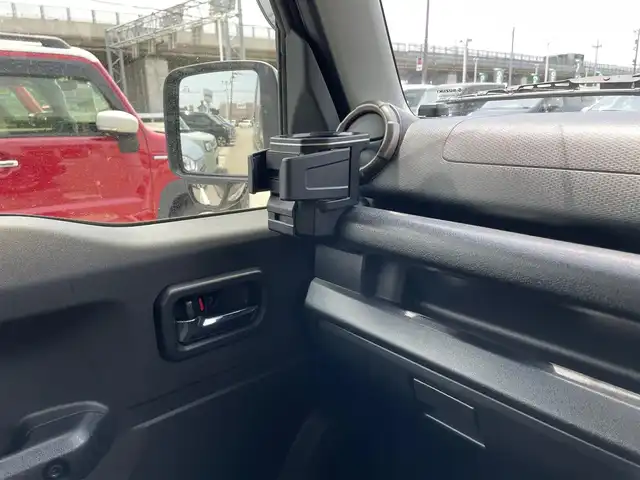 スズキ ジムニー XC 石川県 2022(令4)年 0.9万km ジャングルグリーン 4WD/ターボ/社外8型メモリーナビ/フルセグTV/バックカメラ/LEDヘッドライト/ETC/純正アルミホイール/レーダーブレーキ/シートヒーター/スマートキー/プッシュスタート/電動ミラー/クルーズコントロール/社外グリル/保証書