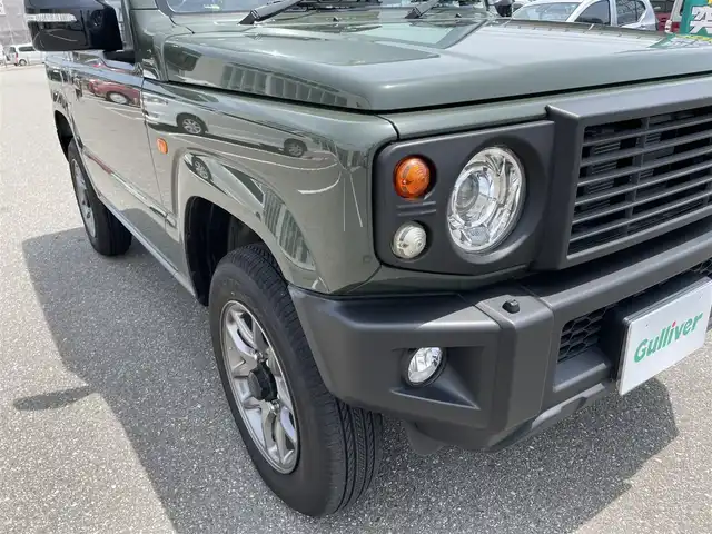 スズキ ジムニー XC 石川県 2022(令4)年 0.9万km ジャングルグリーン 4WD/ターボ/社外8型メモリーナビ/フルセグTV/バックカメラ/LEDヘッドライト/ETC/純正アルミホイール/レーダーブレーキ/シートヒーター/スマートキー/プッシュスタート/電動ミラー/クルーズコントロール/社外グリル/保証書