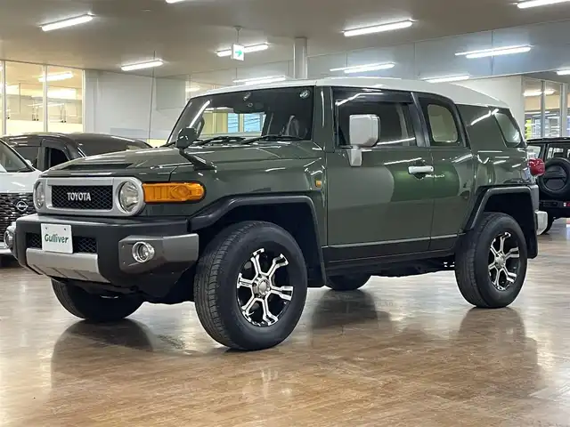 トヨタ ＦＪクルーザー 道央・札幌 2013(平25)年 7.6万km 緑Ⅱ 4WD/MKW製17インチAW/純正SDナビ/・フルセグTV/CD/DVD/SD/BT/バックカメラ/社外前後ドライブレコーダー/前後コーナーセンサー/横滑り防止装置/前後フォグライト/ETC/ヘッドライトレベライザー/純正フロアマット/純正ドアバイザー/ステアリングリモコン/背面タイヤ/カーテンエアバッグ/新車時保証書/取扱説明書
