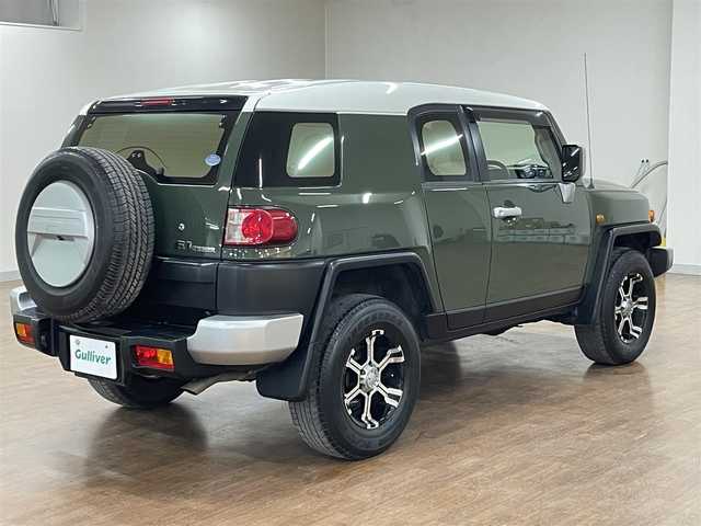 トヨタ ＦＪクルーザー 道央・札幌 2013(平25)年 7.6万km 緑Ⅱ 4WD/MKW製17インチAW/純正SDナビ/・フルセグTV/CD/DVD/SD/BT/バックカメラ/社外前後ドライブレコーダー/前後コーナーセンサー/横滑り防止装置/前後フォグライト/ETC/ヘッドライトレベライザー/純正フロアマット/純正ドアバイザー/ステアリングリモコン/背面タイヤ/カーテンエアバッグ/新車時保証書/取扱説明書